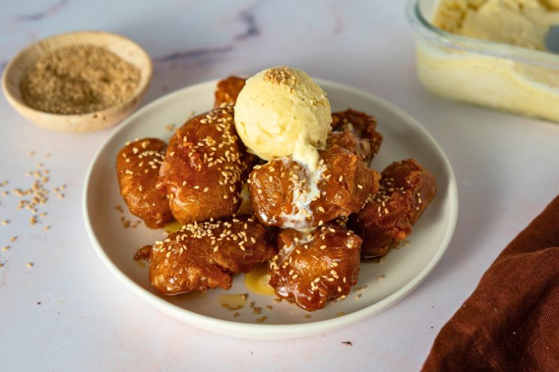 banana fritters in plate with ice cream