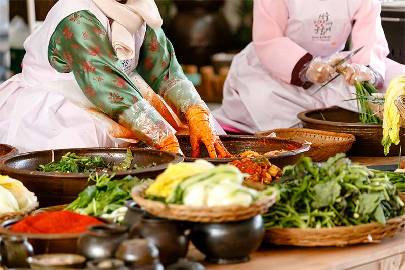 Preparing Asian Kimchi vegetable dish Preparing Asian Kimchi vegetable dish